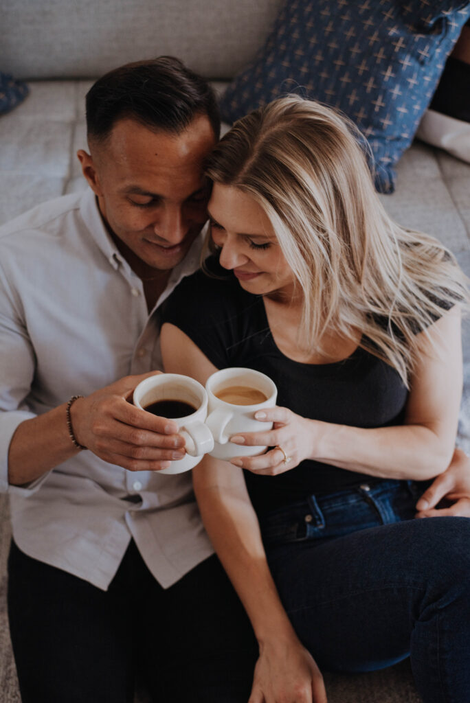 Couple toasting coffee