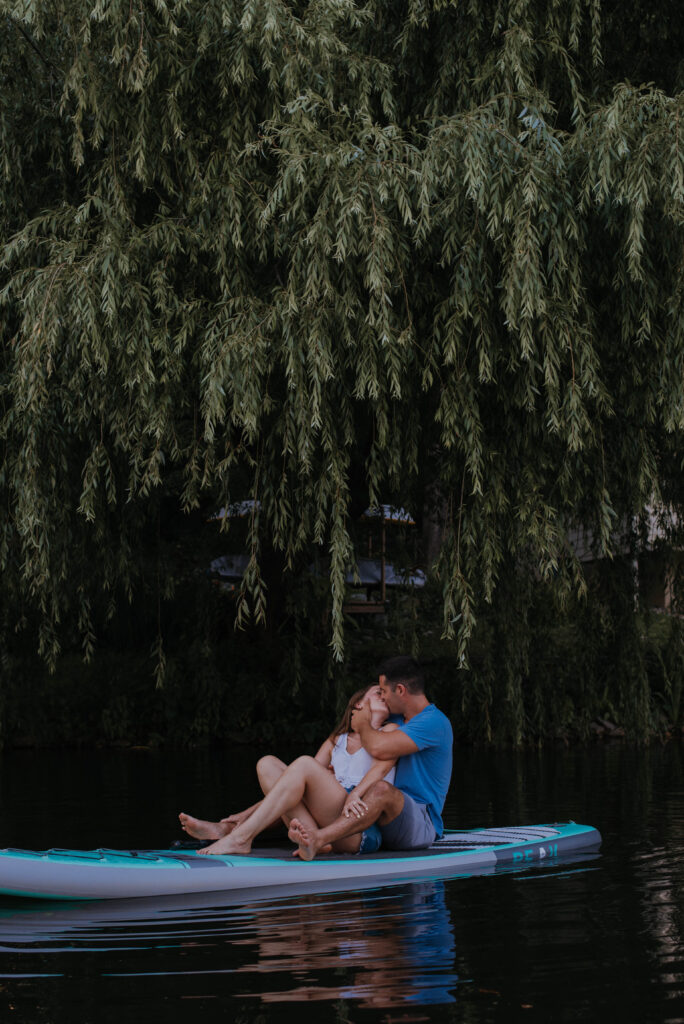 Couple under willow tree