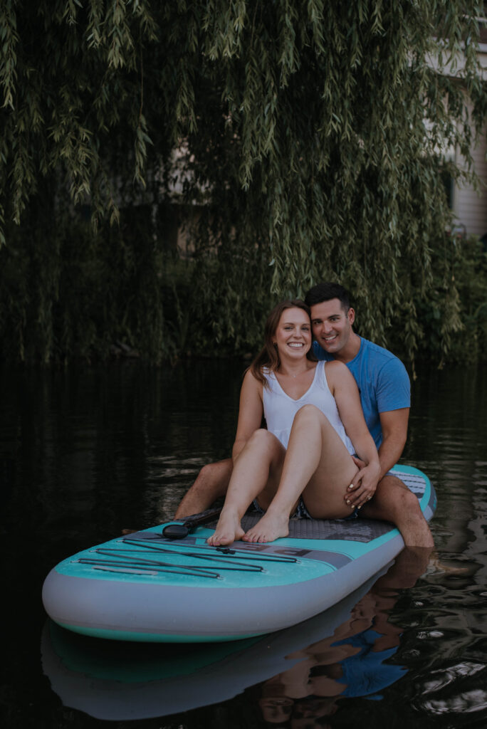 Couple on paddle board