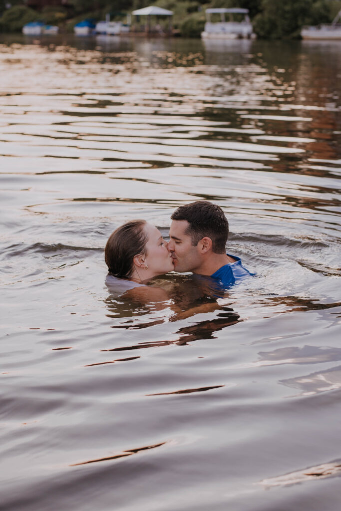 Couple kissing in water