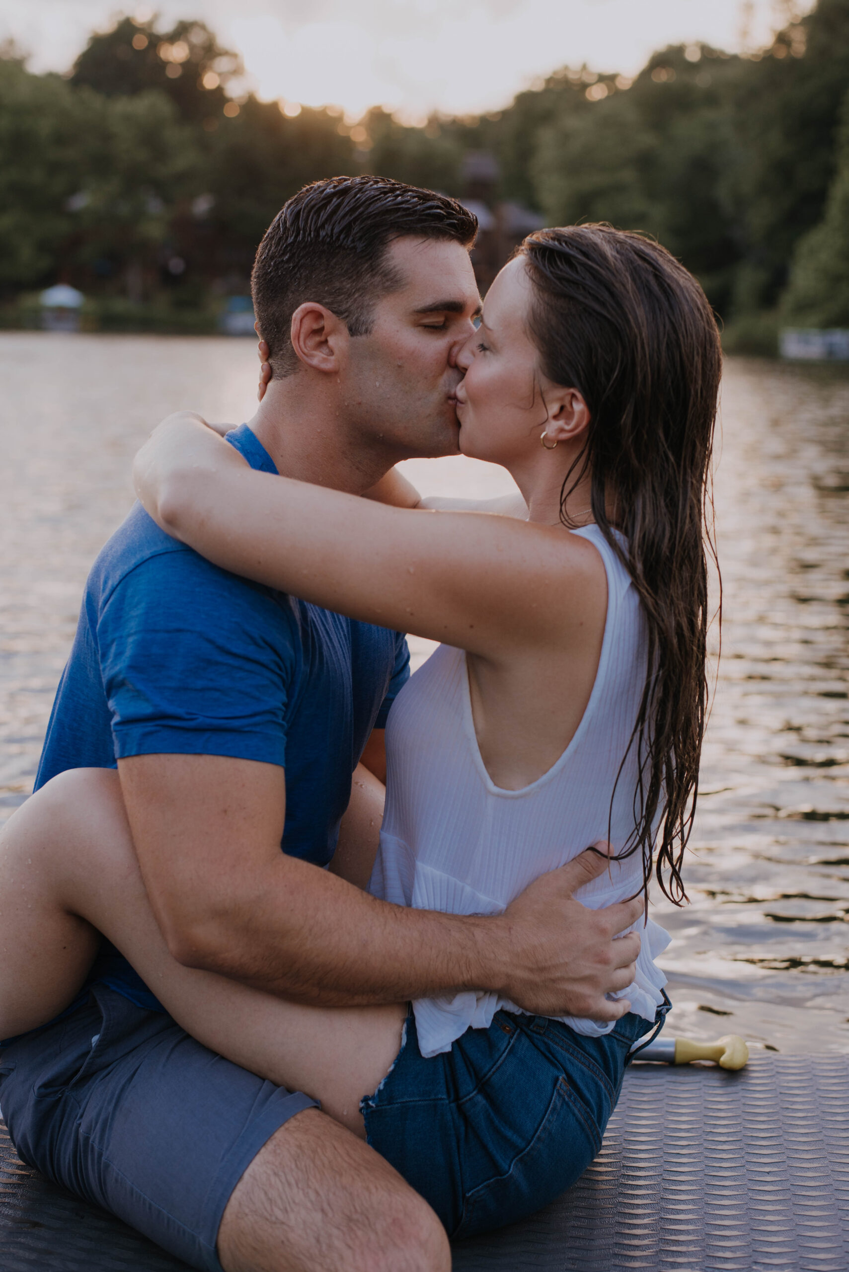 Couple kissing on paddle board