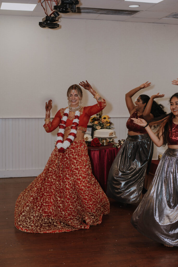 Bride dancing at Hindu Wedding