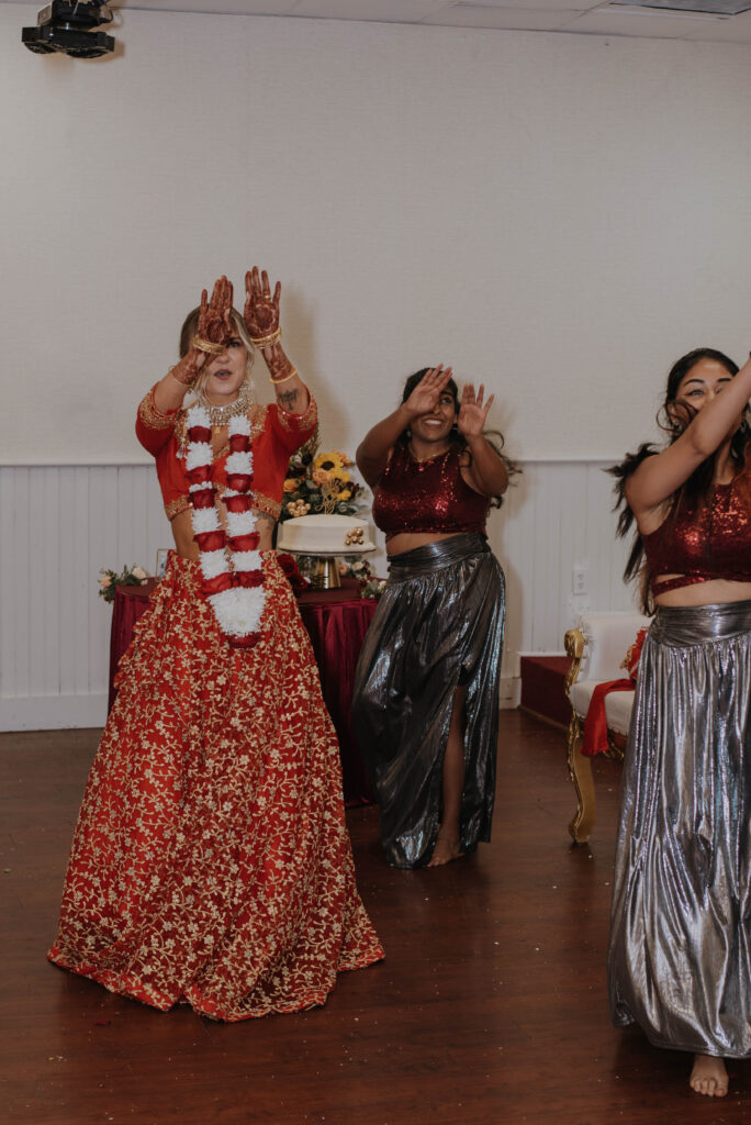 Bride dancing at Hindu Wedding