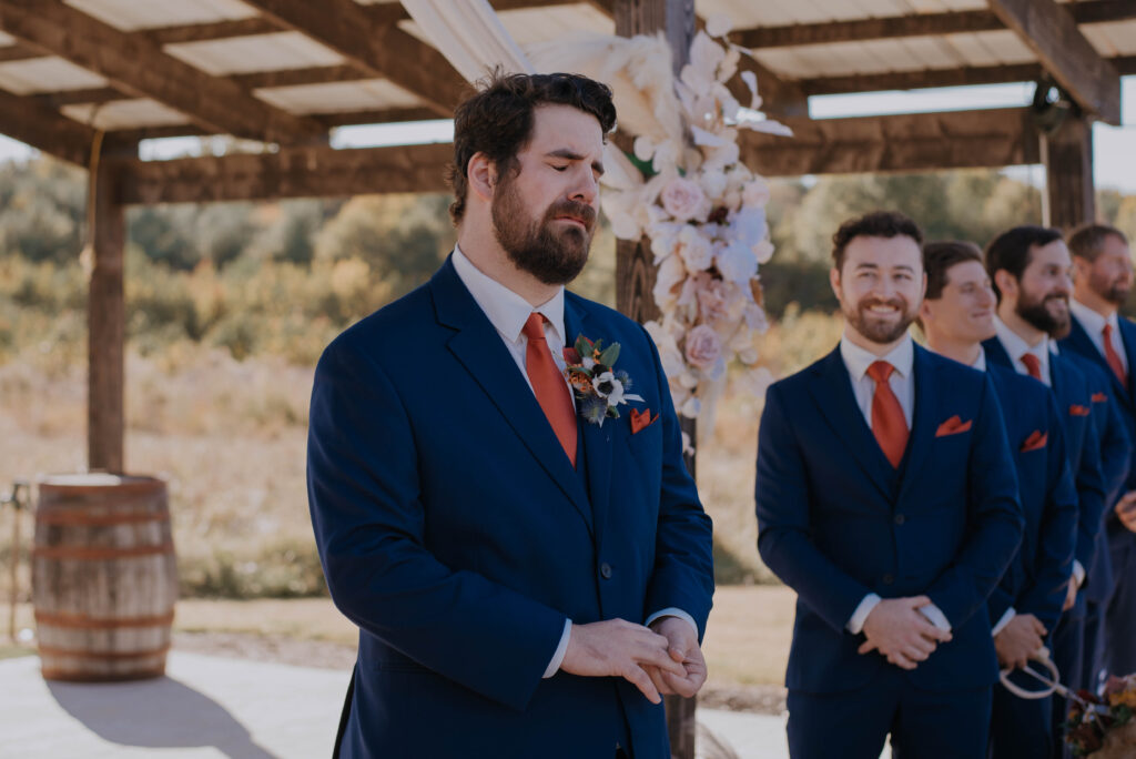 Groom crying during first look