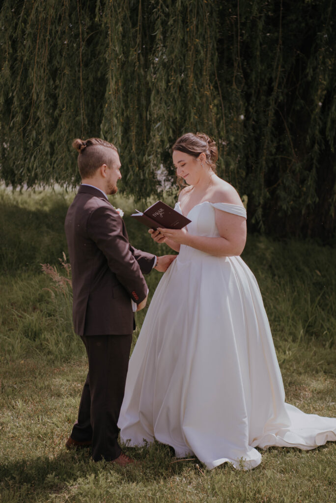 bride and groom sharing private vows before their ceremony